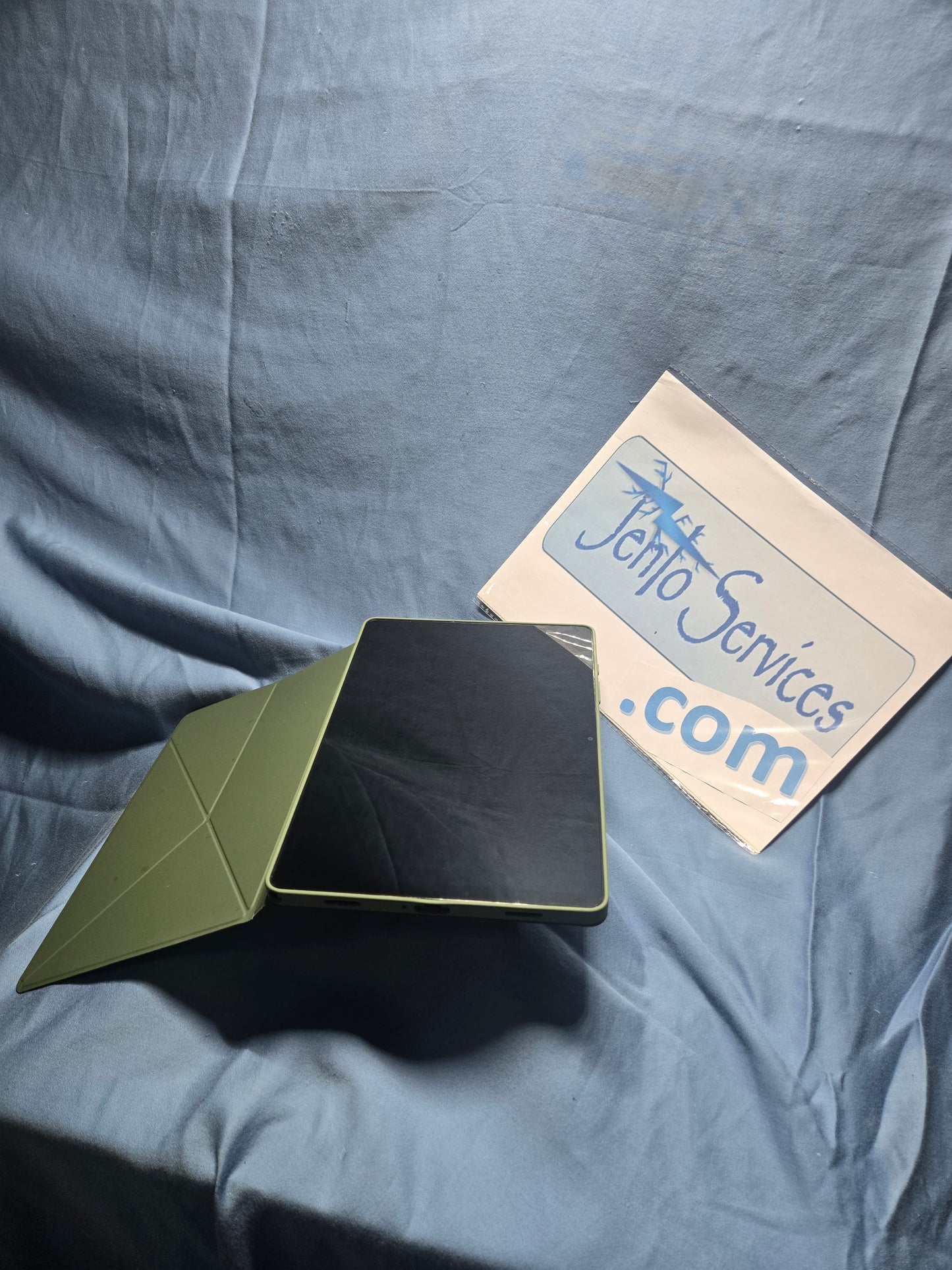 Samsung Galaxy Tab A9+ with book cover