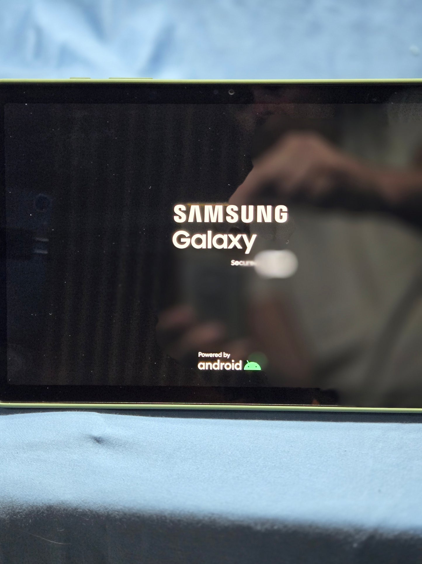 Samsung Galaxy Tab A9+ with book cover