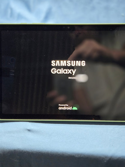 Samsung Galaxy Tab A9+ with book cover