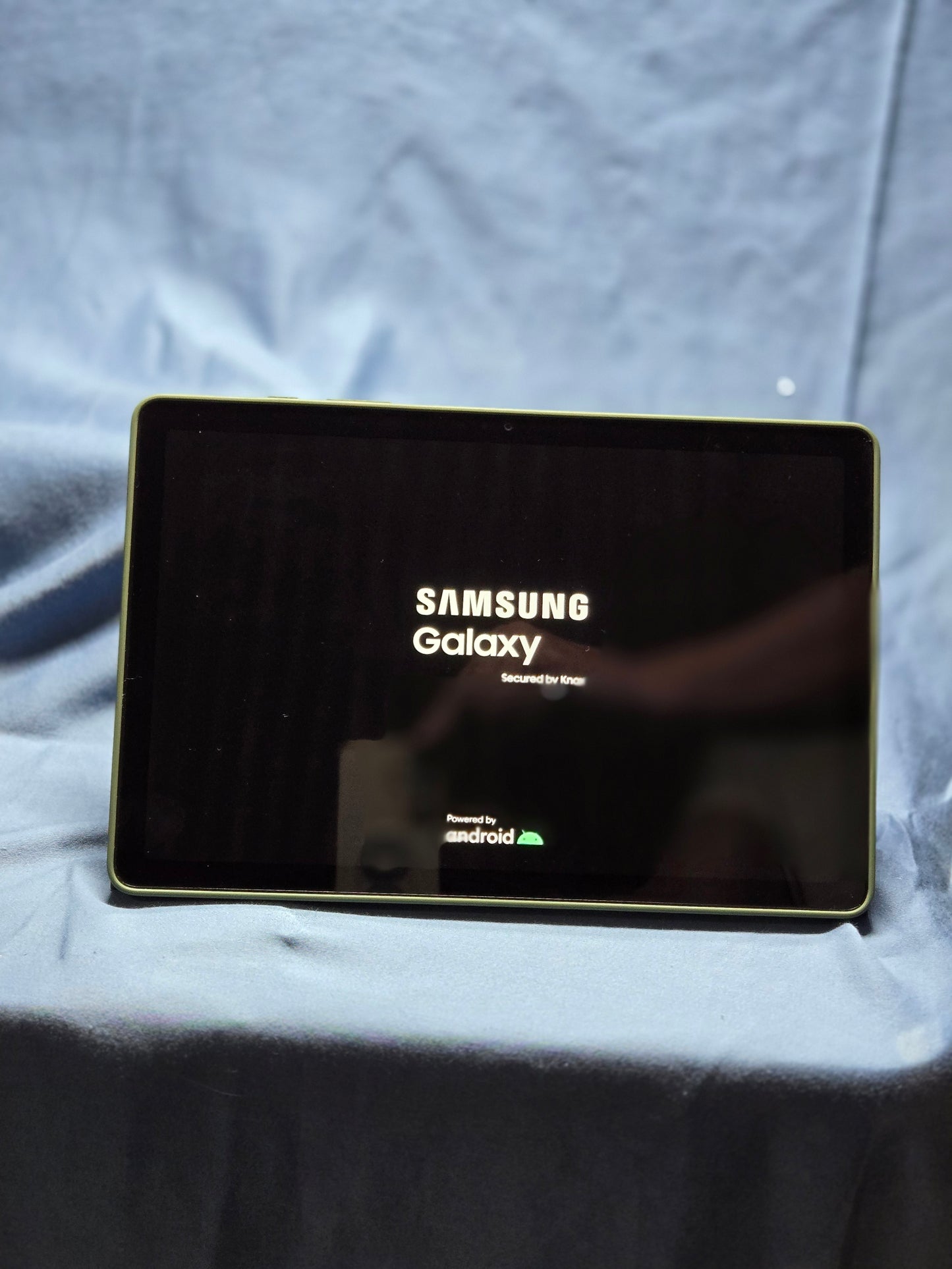 Samsung Galaxy Tab A9+ with book cover