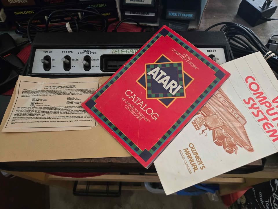Atari 2600 with controllers and lots of favorite games