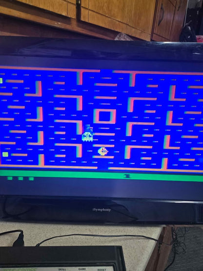 Atari 2600 with controllers and lots of favorite games