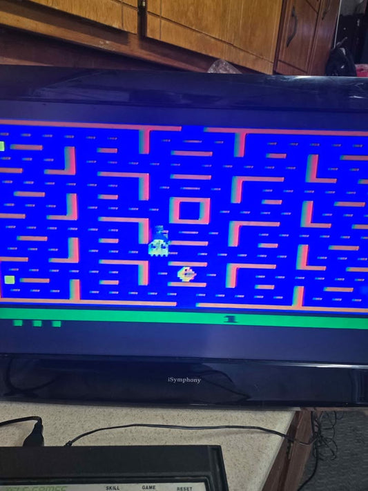 Atari 2600 with controllers and lots of favorite games