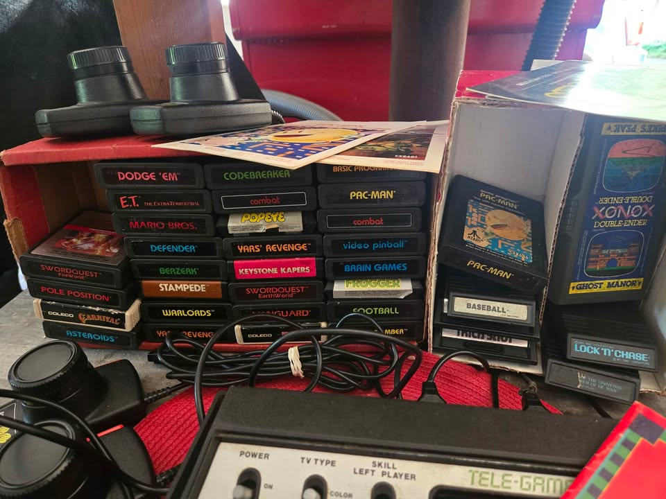 Atari 2600 with controllers and lots of favorite games