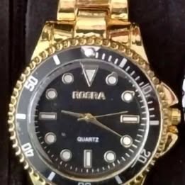 Black and gold sports watch