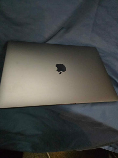 Mac Book Pro. (Screen cracked)